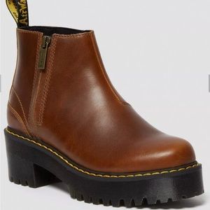 Stacked platform heel.  Side zipped, with Dr Marten heel loop, yellow stitching.
